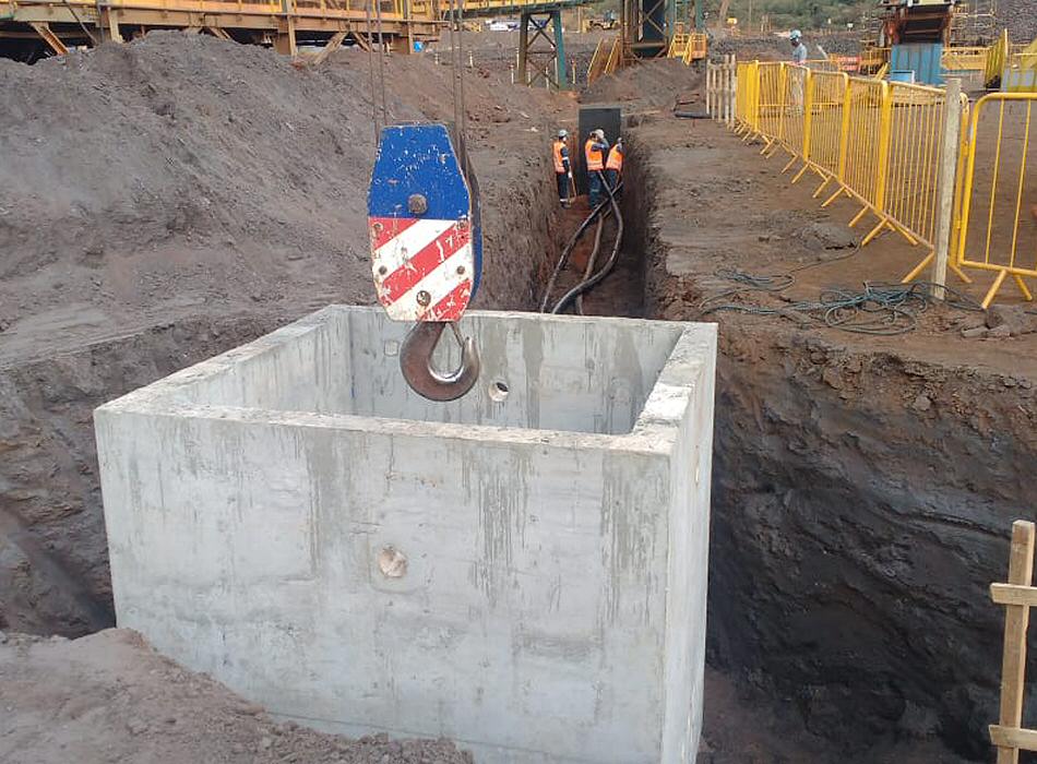 Construção de caixas de passagem de rede de dutos para interligação à Sala Elétrica da Britagem em FZ